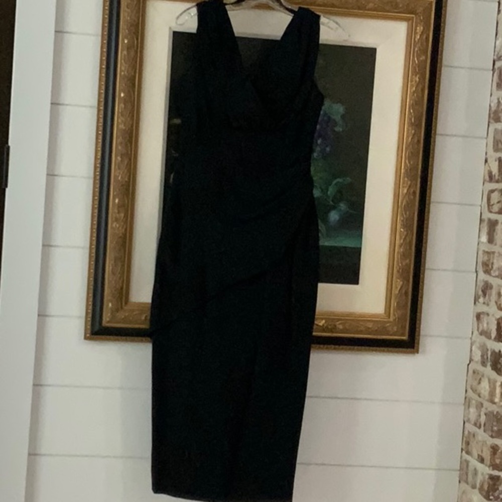 Nicole Miller black crepe dress size 4.  Dress is mid calf length